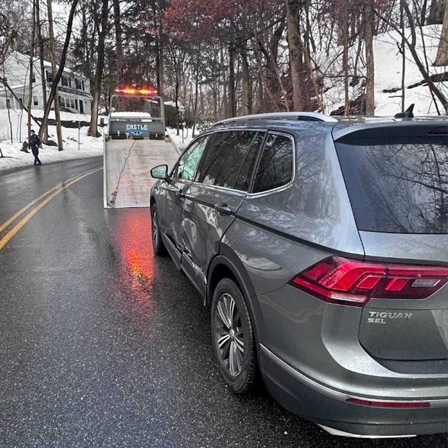 Castle-Auto-and-Towing-Chappaqua-New-York-Flatbed-tow-truck-loading-a-van Castle Auto and Towing Chappaqua New York Flatbed Tow Truck Loading a Van