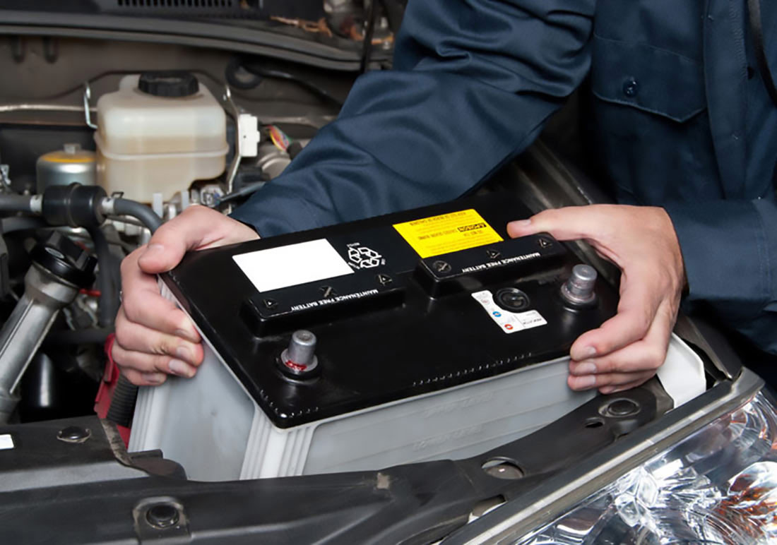 Tow Truck Service Mount Kisco New York Tow Truck Operator Replacing Car Battery 