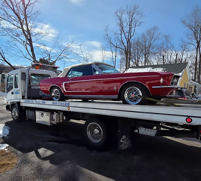 Castle Auto and towing providing a long haul tow for a classic car in Chappaqua, NY